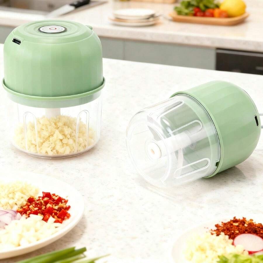 Pequeña picadora-trituradora eléctrica multifuncional de ajo - Tiene también la propiedad de procesador de alimentos pequeño y portátil; puede triturar verduras y ajo. Como procesador de alimentos manual, se puede usar para cortar ajo, cebolla y chile. Su función principal es triturar y picar ajo; gracias a su diseño eléctrico, mejora la eficiencia del procesamiento, y su tamaño compacto facilita su almacenamiento y transporte.