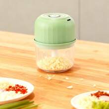 Pequeña picadora-trituradora eléctrica multifuncional de ajo - Tiene también la propiedad de procesador de alimentos pequeño y portátil; puede triturar verduras y ajo. Como procesador de alimentos manual, se puede usar para cortar ajo, cebolla y chile. Su función principal es triturar y picar ajo; gracias a su diseño eléctrico, mejora la eficiencia del procesamiento, y su tamaño compacto facilita su almacenamiento y transporte. - Verde - Ver 4