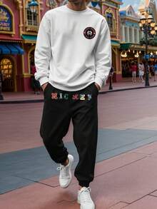 Disney Men's Mickey Mouse Print Sweatshirt And Sweatpants Set, Suitable For Casual Daily Wear, Weekend Outings, Hangouts With Friends, Traveling And Other Relaxed Social Activities. This Sweatsuit Set Is An Essential Versatile Piece In A Man's Wardrobe, And Makes A Great Gift For Boyfriends Or Husbands. - Black and White - View 1