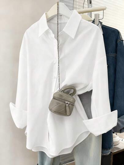 Chemise décontractée à manches longues à épaules tombantes et boutonnage simple en couleur unie pour femmes