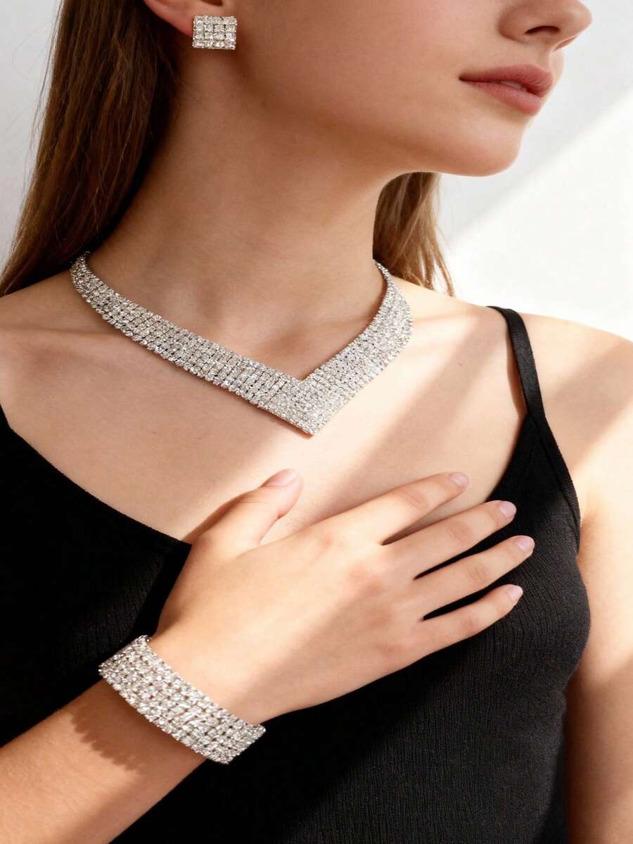 一套闪耀钻石优雅奢华珠宝套装，包括手链、耳环和项链，适合女性在订婚、婚礼、晚宴、万圣节、圣诞节、节日派对等场合佩戴。 - 銀色 - 查看 1