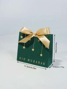 10个优雅的开斋节礼品袋，饰有金色星星吊坠和缎带蝴蝶结，是斋月和开斋节的优质礼品袋，可用于盛装椰枣、糖果、巧克力、小礼物、派对礼品、家庭聚会、节日小吃，也是穆斯林庆祝活动的装饰包装。结实的纸袋非常适合精品礼品、节日餐桌布置和特殊场合的礼品包装。 - 11.5X4.5X10cm - 查看 8