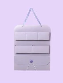 1个悬挂式收纳袋 - 带挂绳，可收纳珠宝和化妆品，方便携带，轻巧设计