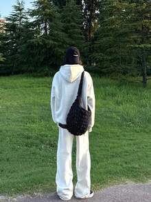 Unisex Vintage Gray Sport Sweatshirt with Unique Cat and Human Face Print. The detailed print features a cat and a human face in a square design, adding a quirky and stylish touch. Perfect for casual outings, streetwear, or everyday wear.  and comfortable, this sweatshirt is a must-have for fashion-forward individuals. #Streetwear #CasualFashion #UnisexStyle - Gris - Ver 3