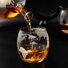 一套豪华地球仪造型威士忌醒酒器，带木质底座，包含一个醒酒器（30盎司）和两个配套酒杯（11盎司），适用于苏格兰威士忌、波本威士忌、利口酒和伏特加，是父亲节、生日和节日的实用礼物。 - 透明色 - 查看 5