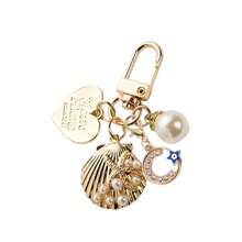 Crescent Moon Devil Metal Pearl Shell Keychain Charm For Bags, Backpacks, Keys, And Everyday Essentials, A Gothic Edgy Accessory With Moonlit Crescent Symbol, Blackened Metal Finish, Subtle Pearl Shell Accent, Durable Alloy Construction, Versatile Bag Charm For Daytime And Nighttime Looks, Perfect Gift For Spring Seasonal Style And Summer Outfit Accessory - Multicolor - View 4