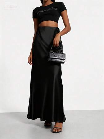 Elegant pendlare minimalistisk enfärgad kjol