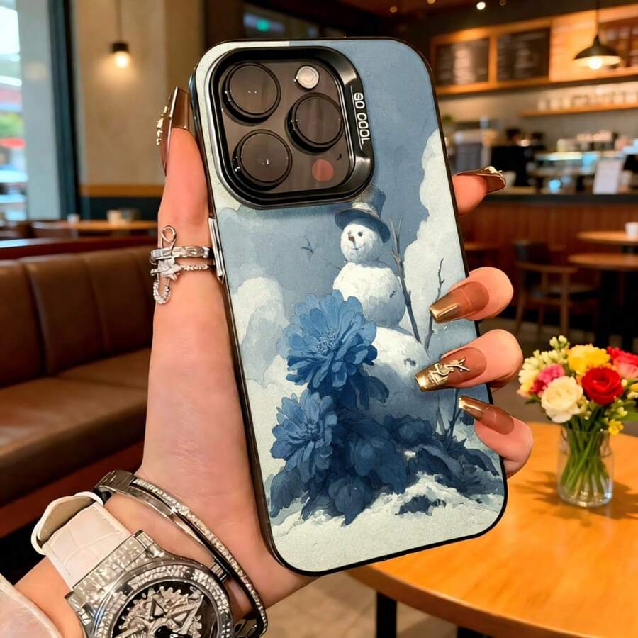 Cubierta de telefono con diseño de nieve y flores azules para iPhone 14 Pro Max en color azul claro con estampado de muñeco de nieve y flores grandes ideal para uso diario en cafeterias y salones - Negro - Ver 1