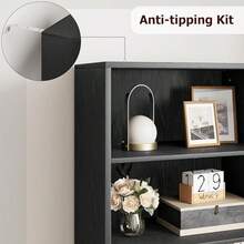 Librería grande de 4 niveles con puertas de tablero de partículas con diseño cruzado, amplio espacio de almacenamiento para oficina en casa y sala de estar - Negro - Ver 7