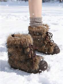 女士人造毛皮内衬雪地靴，保暖时尚，适合冬季穿着，饰有装饰性鞋带和厚底，打造休闲都市风格，可搭配打底裤、紧身裤或裙子，在寒冷的日子里提供舒适和温暖。