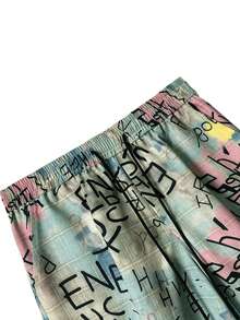 男士时尚街头朋克风格迷彩印花运动裤，必备单品，个性化宽松街头时尚阔腿裤，秋季