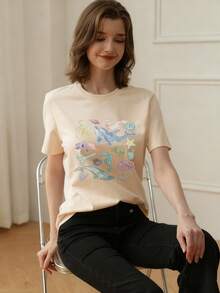 女孩和青少年学生休闲杏色印花圆领短袖 T 恤上衣，夏季