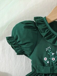 Đầm mùa hè dễ thương in hoa, cổ tròn, tay phồng, trang trí nơ. - Màu xanh lá cây đậm - Xem 5