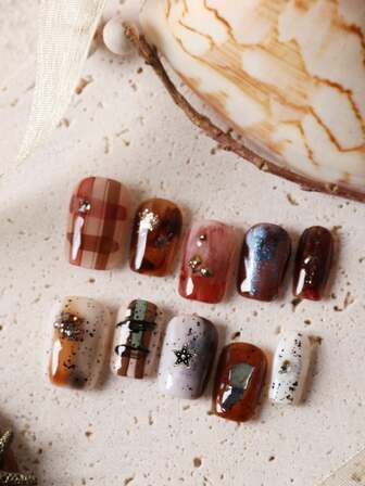 10 piezas de uñas postizas acrílicas de color marrón, uñas azul halación blanco, uñas postizas cortas para uso diario en la oficina. Incluye 1 hoja de pegatinas adhesivas y 1 lima de uñas mini