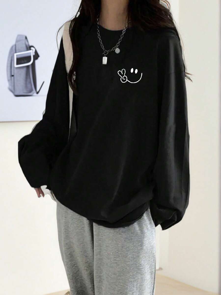 女式休闲笑脸印花超大长袖T恤上衣，百搭秋冬装 - 黑色 - 查看 1