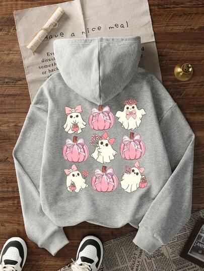 女士冬季南瓜头蝴蝶结小卡通花卉可爱印花长袖抽绳卫衣带口袋，休闲宽松多功能节日风格上衣，女装，冬季女装，时尚冬季服装，适合日常穿着。