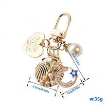 Crescent Moon Devil Metal Pearl Shell Keychain Charm For Bags, Backpacks, Keys, And Everyday Essentials, A Gothic Edgy Accessory With Moonlit Crescent Symbol, Blackened Metal Finish, Subtle Pearl Shell Accent, Durable Alloy Construction, Versatile Bag Charm For Daytime And Nighttime Looks, Perfect Gift For Spring Seasonal Style And Summer Outfit Accessory - Multicolor - View 2