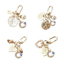 Crescent Moon Devil Metal Pearl Shell Keychain Charm For Bags, Backpacks, Keys, And Everyday Essentials, A Gothic Edgy Accessory With Moonlit Crescent Symbol, Blackened Metal Finish, Subtle Pearl Shell Accent, Durable Alloy Construction, Versatile Bag Charm For Daytime And Nighttime Looks, Perfect Gift For Spring Seasonal Style And Summer Outfit Accessory - Multicolor - View 1