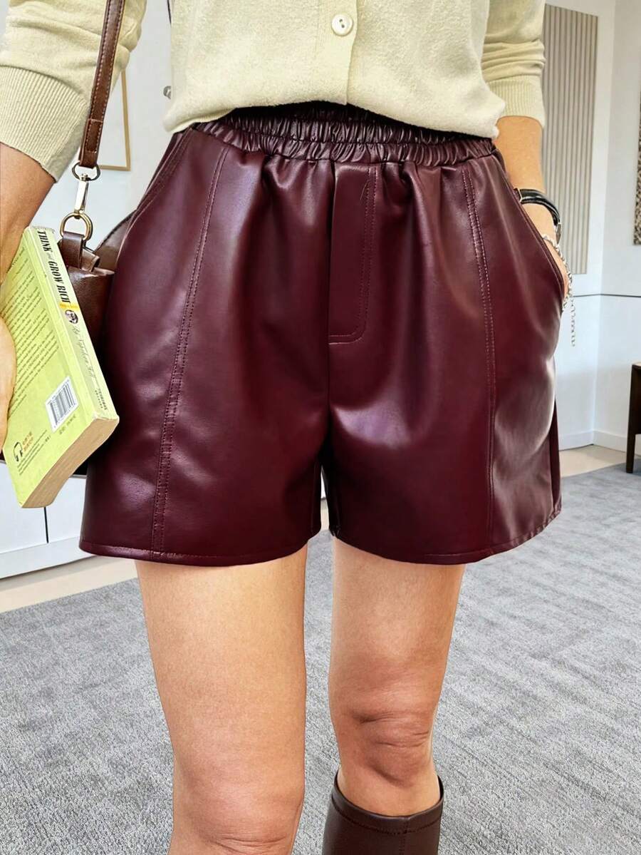 Quần short nữ EARO Chic bằng da giả, kiểu dáng thường ngày, cạp cao, lưng thun, dáng chữ A rộng rãi, có túi, chất liệu da PU, thích hợp mặc hàng ngày vào mùa hè. - Màu Đỏ Sâu - Xem 1