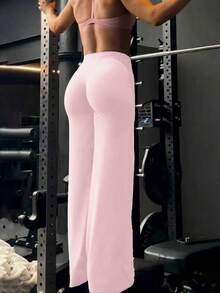 Quần yoga ống rộng màu trơn này thoải mái và tôn dáng, phù hợp cho chạy bộ, tập thể dục và nhiều hoạt động yoga khác nhau. Màu hồng xuân. - Hồng - Xem 11