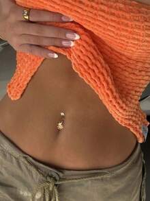 1件S925纯银八角星吊坠，适合肚脐穿孔，是女孩日常佩戴的理想之选，也是送给女友、母亲、姐妹的最佳礼物。 - 單隻肚臍釘 - 查看 2