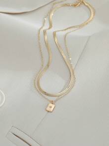 Nooxian 2 piezas Collar colgante de doble capa con cuchilla de acero inoxidable, cadena cuadrada de cobre con micro-incrustación de circonita brillante - Amarillo Oro - Ver 8