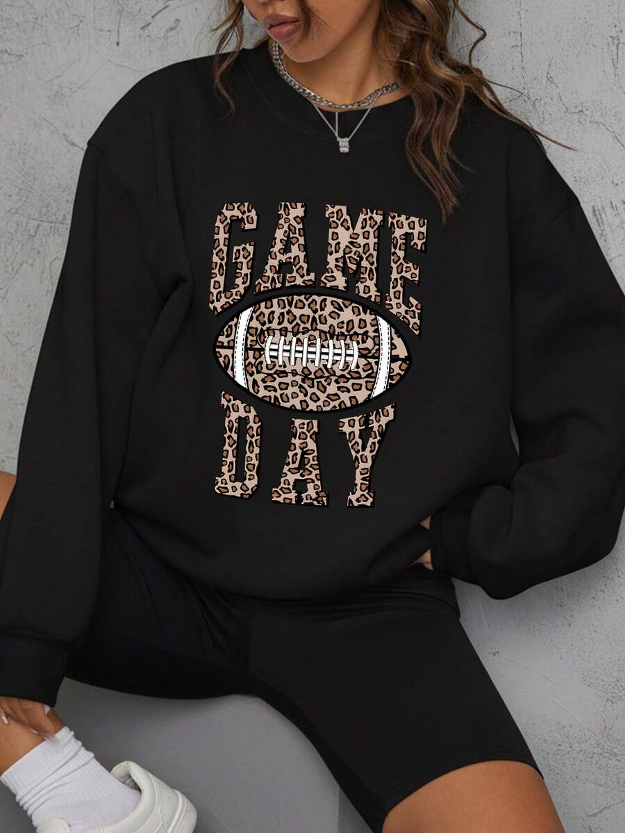 Sudadera de cuello redondo para mujer, pelota de rugby con estampado de leopardo para el día del juego, sudadera holgada de manga larga con estampado de letras, sudadera de cuello redondo - Negro - Ver 1