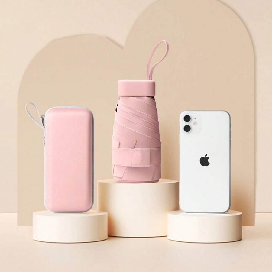 Paraguas de protección solar de moda para mujeres, paraguas mini cápsula con bolsa de almacenamiento, paraguas plegable y ligero, protección UV, adecuado para días soleados y lluviosos, con paquete de almacenamiento - Rosa - Ver 1
