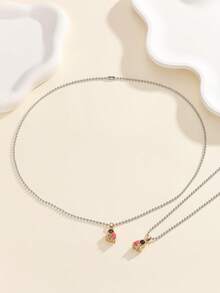 ATLVXJL 2件套夜光情侣/友谊项链套装，渐变粉色和金色半心形宇航员设计，休闲饰品，适合日常佩戴和节日礼物