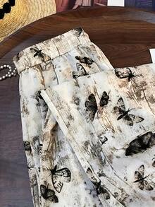 女士高腰复古蝴蝶印花直筒裤，适合春夏休闲外出和度假旅行，全身印花动物图案口袋，无拉链 - 杏色 - 查看 2