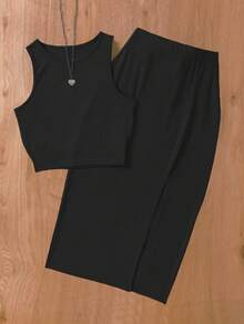 女士纯色优雅休闲分体套装，包括背心和半裙，适合春夏晚宴、办公室、花园等场合，黑色。 - 黑色 - 查看 2