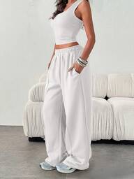 Pantalon de jogging décontracté et ample pour femmes, de couleur unie, taille élastique avec poches