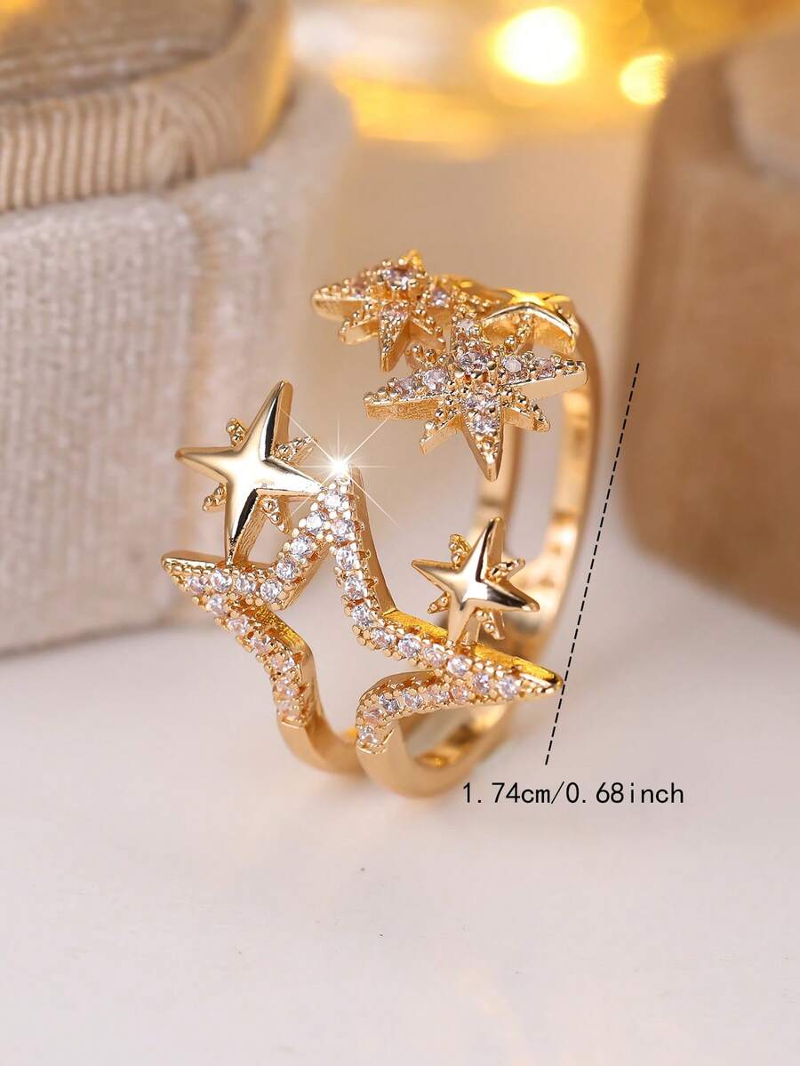 Vanel An Elegant Open Ring From The Star Collection For Women - A Stylish And Minimalist Design, Featuring A Sparkling Cubic Zirconia Stone And A Golden Yellow Open Shape, Suitable For Everyday Wear And As A Gift.