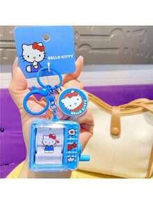 Móc khóa máy hoạt hình phát sáng hình trái tim Sanrio Hello Kitty - Móc khóa đèn nhấp nháy hoạt hình dễ thương chính thức, Thiết kế hiệu ứng ánh sáng hình trái tim và hiệu ứng hoạt hình, Chất liệu ABS bền bỉ với móc khóa chắc chắn, Phụ kiện nhân vật dễ thương cho túi xách, chìa khóa, điện thoại, Mặt dây chuyền đèn LED sáng tạo, Quà tặng hoàn hảo cho các cô gái tuổi teen hâm mộ Sanrio, Móc khóa đồ chơi trang trí độc quyền xuyên biên giới của SHEIN - Nhiều màu - Xem 5