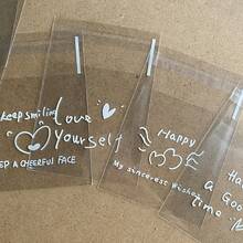 Khoảng 100 túi quà tặng tự dính hình trái tim trong suốt 4 trong 1, in hình câu nói truyền cảm hứng - Túi quà tặng bằng nhựa, thích hợp cho sinh nhật, đám cưới, ngày lễ - Túi đựng quà nhỏ tái sử dụng, túi quà tặng, túi quà tặng ngày lễ, thiết kế hình trái tim, túi tự dán. - Trong sáng - Xem 9