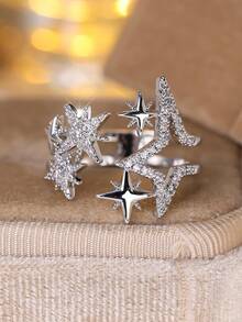 Vanel An Elegant Open Ring From The Star Collection For Women - A Stylish And Minimalist Design, Featuring A Sparkling Cubic Zirconia Stone And A Golden Yellow Open Shape, Suitable For Everyday Wear And As A Gift.