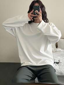 DAZY Women's Solid Color Casual Long Sleeve Loose Fit Round Neck T-Shirt Fall Tops