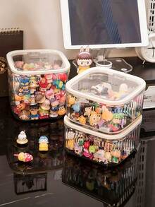 1个透明桌面收纳盒，桌面展示收纳盒，创意按压式开盖设计，适合存放化妆品、文具、玩具、杂物等。