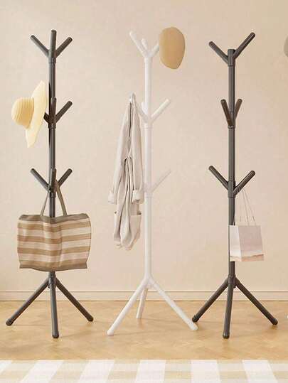 1个现代树形落地式衣帽架 - 稳固的三角形底座，塑料材质，轻巧设计，挂钩可360°旋转，节省空间，适用于玄关、卧室和客厅。北欧简约单杆卧室衣帽架，易于组装，适合家庭、办公室或酒店使用。提供黑色/白色两种颜色，可选6个或9个挂钩，多功能收纳，适合公寓生活。