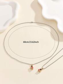 ATLVXJL 2件套夜光情侣/友谊项链套装，渐变粉色和金色半心形宇航员设计，休闲饰品，适合日常佩戴和节日礼物