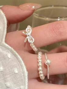 3件套简约蝴蝶结珍珠串珠可调节戒指套装，优雅百搭的日常饰品，送给女友、姐妹、圣诞节、情人节、生日、母亲节的绝佳礼物 - 白色 - 查看 4