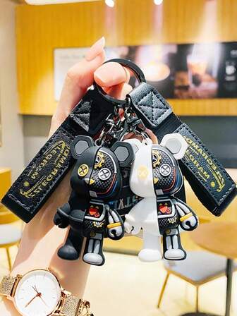 1个机械熊钥匙扣，卡通包包挂饰，男士钥匙扣，女士钥匙扣，腕带钥匙扣，情侣钥匙扣，汽车钥匙扣，钥匙挂绳，包包挂饰，钥匙扣配件，背包钥匙圈，生日礼物，朋友礼物，女士礼物，男友礼物，圣诞礼物。