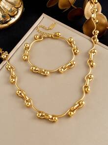 1 套不锈钢时尚项链 + 手链首饰套装，适合日常佩戴、礼物