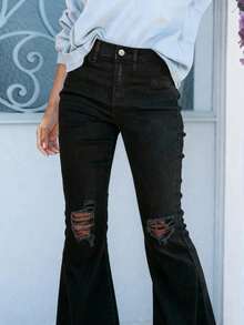 撕破原始下摆喇叭腿牛仔裤，女式纽扣、口袋、原始下摆、撕破、拉链高腰喇叭腿超长黑色常规版型女式牛仔裤，春季/秋季，休闲日常穿着