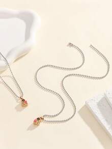 ATLVXJL 2件套夜光情侣/友谊项链套装，渐变粉色和金色半心形宇航员设计，休闲饰品，适合日常佩戴和节日礼物