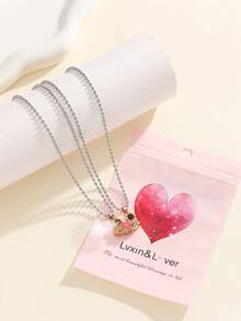 ATLVXJL 2件套夜光情侣/友谊项链套装，渐变粉色和金色半心形宇航员设计，休闲饰品，适合日常佩戴和节日礼物