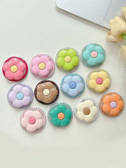 一款小巧清新的纯色花朵磁吸式手机气囊支架，稳固伸缩式桌面懒人环扣支架