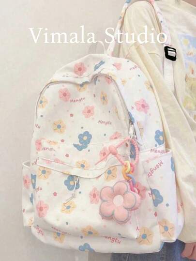 Mochila con estampado de dibujos animados y bloques de color para mujer, bolsa escolar casual y mochila de viaje con gran capacidad y colgante de flor (posición de impresión aleatoria)