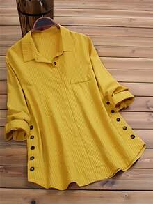 女士长袖翻领衬衫，常规版型，涤纶面料，纽扣细节，侧边口袋
