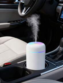 一个300毫升车载空气清新剂,室内香氛加湿器,USB供电,两种工作模式,7色LED灯,缺水智能关机,静音喷雾,方便的精油扩散器,非常适合房间装饰、办公室、客厅、汽车使用,也是送给女性的精美礼物。 - 彩色 - 查看 5